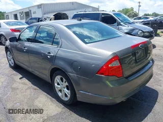 2012 Ford Fusion SE with VIN 3FAHP0HG5CR291511, listed as a IAAI auction lot 42546174 with 241,493 mi miles and . Bid and sale history available at DreamBid. Image 3.