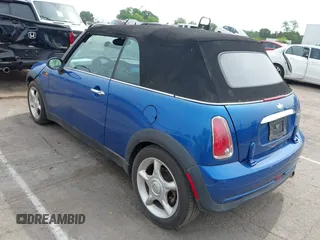 2006 MINI Convertible with VIN WMWRF33566TF65679, listed as a IAAI auction lot 42288864 with 119,884 mi miles and . Bid and sale history available at DreamBid. Image 3.