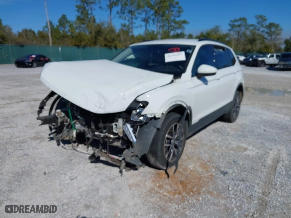 2021 Volkswagen Tiguan S with VIN 3VV1B7AX9MM056025, listed as a IAAI auction lot 41352521 with 98,944 mi miles. Bid and sale history available at carsss.com. Image 2.