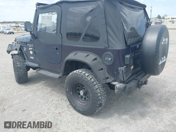 1997 Jeep Wrangler Sport with VIN 1J4FY19S2VP481780, listed as a IAAI auction lot 41822213 with 156,629 mi miles. Bid and sale history available at carsss.com. Image 3.