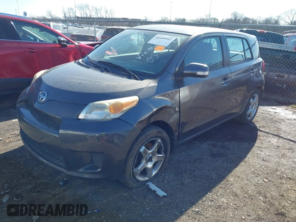 2010 Scion xD with VIN JTKKU4B49AJ051263, listed as a IAAI auction lot 41439982 with 181,050 mi miles. Bid and sale history available at carsss.com. Image 2.