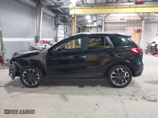 2016 Mazda CX-5 Grand Touring with VIN JM3KE2DY9G0635368, listed as a IAAI auction lot 41699616 with 240,619 mi miles. Bid and sale history available at carsss.com. Image 15.