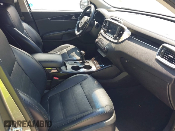 2018 Kia Sorento EX z VIN 5XYPH4A57JG410055, wystawiony jako IAAI lot #42023771 z przebiegiem 53 984 mil mil oraz . Historia ofert i sprzedaży dostępna na DreamBid. Obrazek 5.