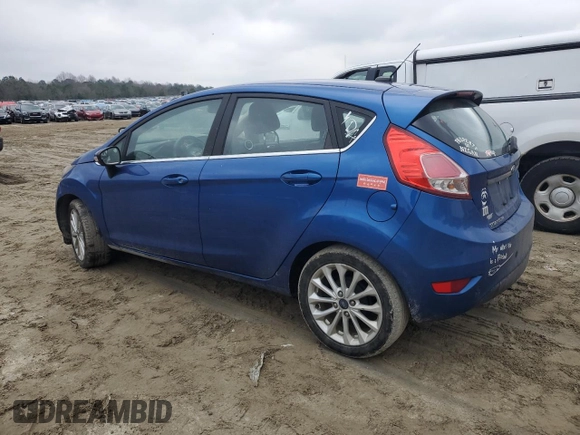 2018 Ford Fiesta Titanium z VIN 3FADP4FJ5JM111183, wystawiony jako Copart lot #41426244 z przebiegiem 77 525 mil mil oraz . Historia ofert i sprzedaży dostępna na DreamBid. Obrazek 2.
