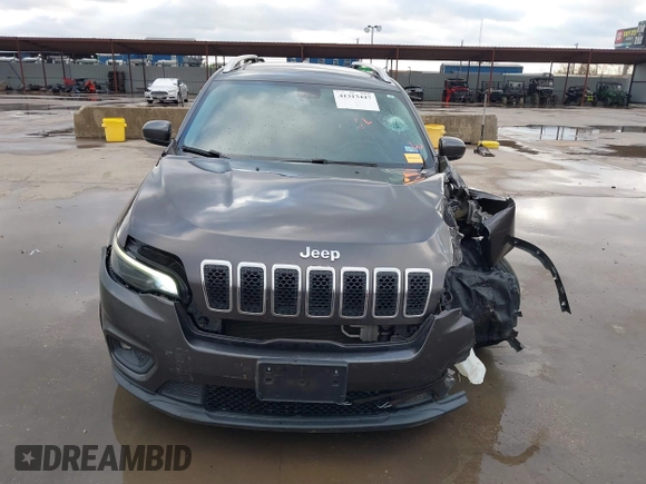 2019 Jeep Cherokee Latitude Plus z VIN 1C4PJLLX1KD241874, wystawiony jako IAAI lot #41313447 z przebiegiem 108 649 mil mil oraz . Historia ofert i sprzedaży dostępna na DreamBid. Obrazek 12.