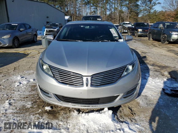 2016 Lincoln MKZ with VIN 3LN6L2JK8GR616239, listed as a Copart auction lot 87861415 with 99,199 mi miles and Salvage title. Bid and sale history available at DreamBid. Image 5.