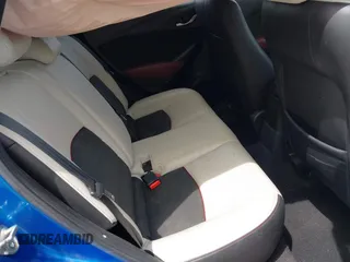 2016 Mazda CX-3 Grand Touring z VIN JM1DKFD78G0134173, wystawiony jako IAAI lot #42179942 z przebiegiem 93 539 mil mil oraz . Historia ofert i sprzedaży dostępna na DreamBid. Obrazek 8.