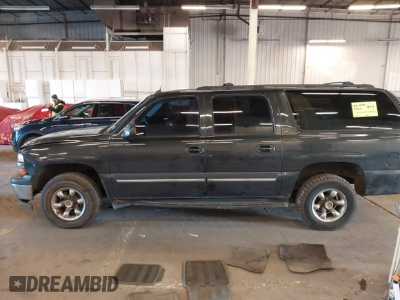 2004 Chevrolet Suburban LT z VIN 1GNFK16Z64J268977, wystawiony jako IAAI lot #41573029 z przebiegiem 181 923 mil mil oraz . Historia ofert i sprzedaży dostępna na DreamBid. Obrazek 14.