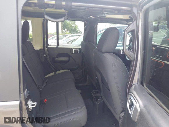 2019 Jeep Wrangler Unlimited Sport S with VIN 1C4HJXDN4KW577273, listed as a IAAI auction lot 42435847 with 69,403 mi miles and . Bid and sale history available at DreamBid. Image 8.