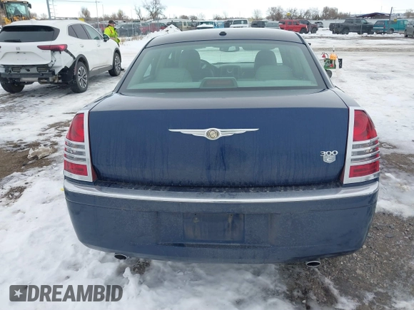2006 Chrysler 300 C with VIN 2C3LA63H96H289693, listed as a IAAI auction lot 41308366 with 128,814 mi miles. Bid and sale history available at carsss.com. Image 17.