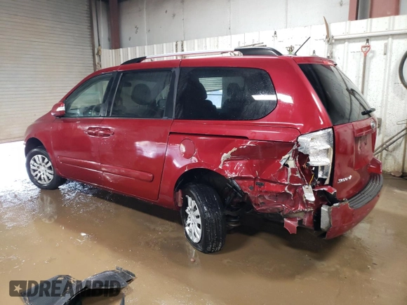 2012 Kia Sedona LX with VIN KNDMG4C71C6432577, listed as a Copart auction lot 49298405 with 205,983 mi miles and Salvage Title. Bid and sale history available at carsss.com. Image 2.