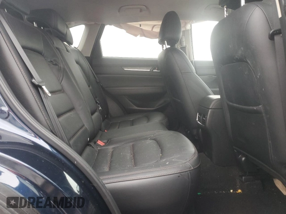 2021 Mazda CX-5 Grand Touring with VIN JM3KFBDM0M0391325, listed as a Copart auction lot 44863215 with 21,997 mi miles and Salvage Title. Bid and sale history available at DreamBid. Image 12.