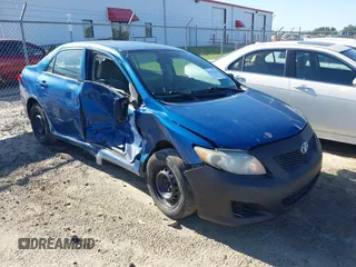 2009 Toyota Corolla with VIN 2T1BU40E69C166333, listed as a IAAI auction lot 42137539 with 127,564 mi miles. Bid and sale history available at carsss.com. Image 1.