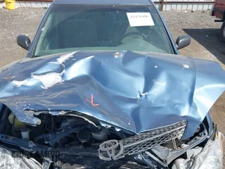 2004 Toyota Camry LE z VIN JTDBE32K140260522, wystawiony jako IAAI lot #42476400 z przebiegiem 152 466 mil mil oraz . Historia ofert i sprzedaży dostępna na DreamBid. Obrazek 12.