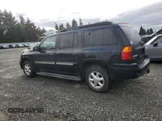 2003 GMC Envoy XL SLT with VIN 1GKES16S036191987, listed as a Copart auction lot 76776604 with 253,889 mi miles and Salvage Title. Bid and sale history available at carsss.com. Image 2.