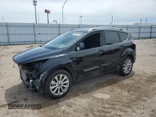 2018 Ford Escape Titanium with VIN 1FMCU9J95JUB31286, listed as a Copart auction lot 58721355 with 100,329 mi miles and Salvage title. Bid and sale history available at DreamBid. Image 1.