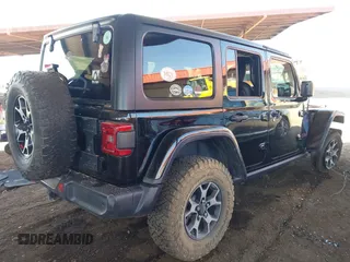 2019 Jeep Wrangler Unlimited Rubicon with VIN 1C4HJXFN5KW522991, listed as a IAAI auction lot 42609616 with 111,844 mi miles and . Bid and sale history available at DreamBid. Image 4.