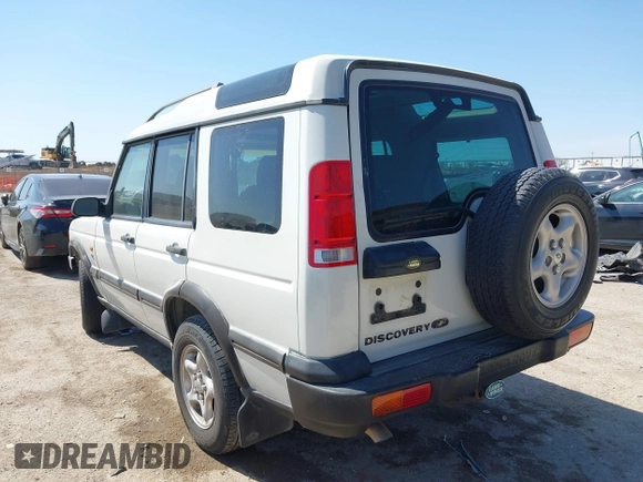 2000 Land Rover Discovery Cloth z VIN SALTY124XYA262828, wystawiony jako IAAI lot #41769729 z przebiegiem 215 711 mil mil oraz . Historia ofert i sprzedaży dostępna na DreamBid. Obrazek 3.