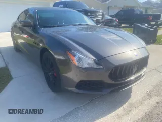 2017 Maserati Quattroporte z VIN ZAM56RRS3H1233644, wystawiony jako Copart lot #87771695 z przebiegiem 61 499 mil mil oraz Szkoda całkowita • Salvage title. Historia ofert i sprzedaży dostępna na DreamBid. Obrazek 1.