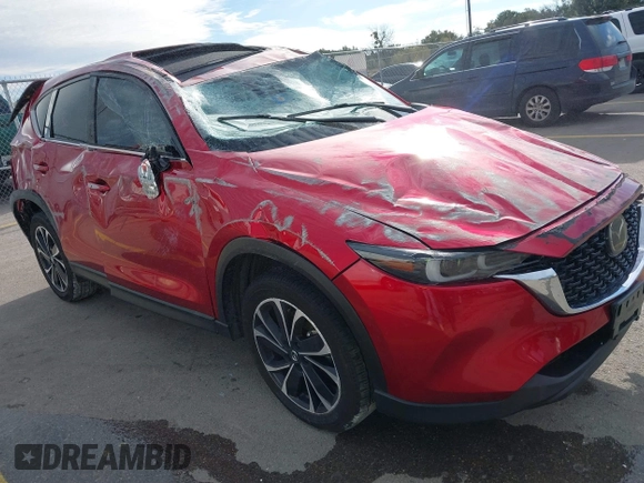 2023 Mazda CX-5 2.5 S Premium Package with VIN JM3KFBDM7P0165741, listed as a IAAI auction lot 41343299 with 35,684 mi miles. Bid and sale history available at carsss.com. Image 1.