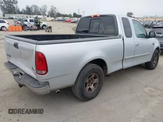 2000 Ford F-150 XL with VIN 1FTRX17W0YKA70861, listed as a IAAI auction lot 42096438 with 1 mi miles. Bid and sale history available at carsss.com. Image 4.