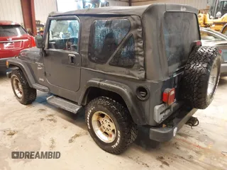 2001 Jeep Wrangler Sport with VIN 1J4FA49SX1P375657, listed as a IAAI auction lot 41943331 with 170,640 mi miles. Bid and sale history available at carsss.com. Image 3.