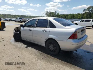 2007 Ford Focus S z VIN 1FAFP34N97W264411, wystawiony jako Copart lot #53251655 z przebiegiem 159 516 mil mil oraz Szkody całkowita. Historia ofert i sprzedaży dostępna na DreamBid. Obrazek 2.