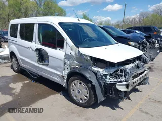 2014 Ford Transit Connect XLT with VIN NM0GS9F77E1163289, listed as a IAAI auction lot 41997365 with 194,643 mi miles and . Bid and sale history available at DreamBid. Image 1.
