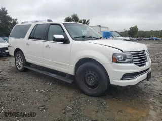 2015 Lincoln Navigator L with VIN 5LMJJ3JT4FEJ14048, listed as a Copart auction lot 73181634 with 160,350 mi miles and Clean Title. Bid and sale history available at carsss.com. Image 4.