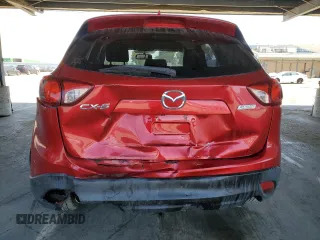 2016 Mazda CX-5 Sport with VIN JM3KE2BY8G0837203, listed as a Copart auction lot 54960845 with 116,656 mi miles and Salvage title. Bid and sale history available at DreamBid. Image 6.