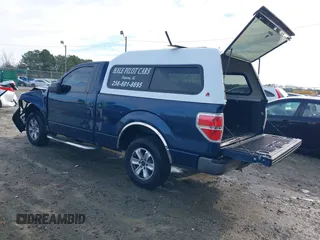 2013 Ford F-150 XL with VIN 1FTMF1CM1DKG40796, listed as a IAAI auction lot 41208425 with 154,987 mi miles and . Bid and sale history available at carsss.com. Image 3.