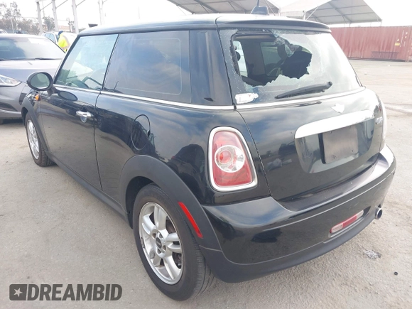 2011 MINI Hardtop with VIN WMWSU3C50BT098905, listed as a IAAI auction lot 42637688 with 118,389 mi miles and . Bid and sale history available at DreamBid. Image 3.