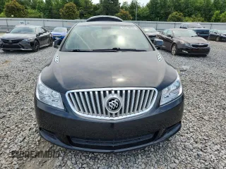 2011 Buick LaCrosse CX с VIN 1G4GA5EC7BF105819, выставлен на аукционе Copart как лот 62518015 с пробегом 164 366 миль миль и Списание • Salvage title. История ставок и продаж доступна на DreamBid. Изображение 5.