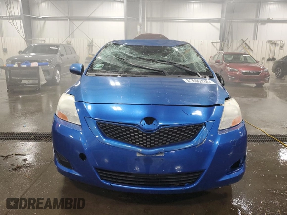 2009 Toyota Yaris with VIN JTDBT903991315725, listed as a Copart auction lot 52566735 with 177,044 mi miles and Salvage Title. Bid and sale history available at DreamBid. Image 5.