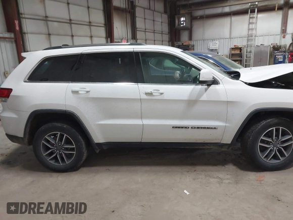 2020 Jeep Grand Cherokee Altitude with VIN 1C4RJFAG9LC344304, listed as a IAAI auction lot 41035821 with 61,723 mi miles and . Bid and sale history available at DreamBid. Image 13.