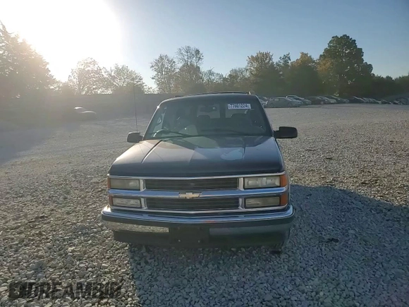 1999 Chevrolet Suburban with VIN 3GNEC16R3XG257322, listed as a Copart auction lot 77601224 with 196,923 mi miles and Salvage Title. Bid and sale history available at carsss.com. Image 12.