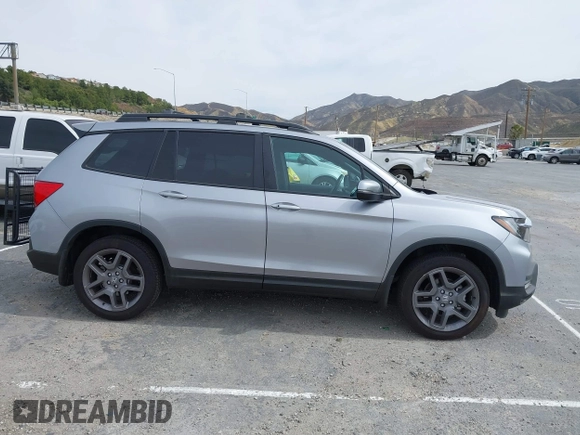 2023 Honda Passport EX-L with VIN 5FNYF8H53PB034963, listed as a IAAI auction lot 41686154 with 12,572 mi miles and . Bid and sale history available at carsss.com. Image 13.