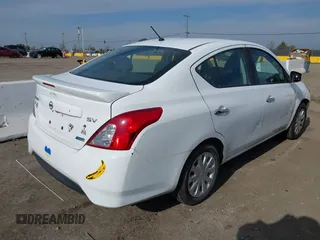 2016 Nissan Versa S Plus with VIN 3N1CN7AP6GL886585, listed as a IAAI auction lot 41411441 with 128,283 mi miles. Bid and sale history available at carsss.com. Image 4.
