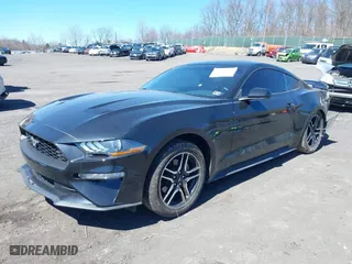 2020 Ford Mustang EcoBoost with VIN 1FA6P8TH2L5128971, listed as a IAAI auction lot 41858299 with 31,207 mi miles. Bid and sale history available at carsss.com. Image 2.