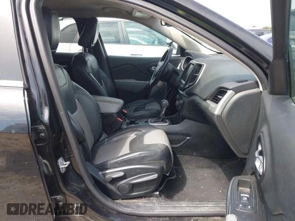 2014 Jeep Cherokee Limited with VIN 1C4PJLDB4EW256137, listed as a IAAI auction lot 42236043 with 145,517 mi miles and . Bid and sale history available at DreamBid. Image 5.