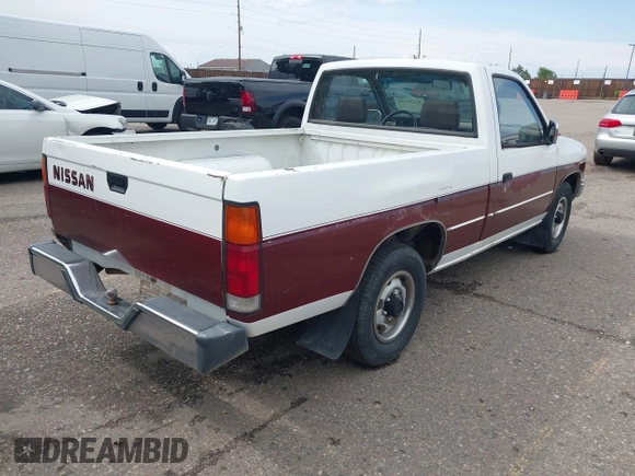 1991 Nissan Frontier XE with VIN 1N6SD11SXMC410552, listed as a IAAI auction lot 42439633 with 137,350 mi miles and . Bid and sale history available at DreamBid. Image 4.