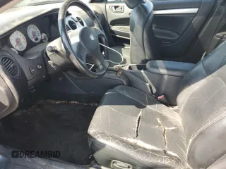 2004 Dodge Stratus z VIN 4B3AG52H34E121341, wystawiony jako Copart lot #58497634 z przebiegiem 169 534 mil mil oraz Szkody całkowita. Historia ofert i sprzedaży dostępna na DreamBid. Obrazek 7.