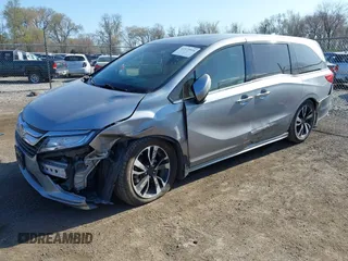 2018 Honda Odyssey Elite z VIN 5FNRL6H91JB070355, wystawiony jako IAAI lot #41975916 z przebiegiem 147 022 mil mil oraz . Historia ofert i sprzedaży dostępna na DreamBid. Obrazek 18.