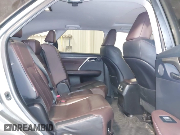 2018 Lexus RX 350L Premium z VIN JTJDZKCA6J2004385, wystawiony jako IAAI lot #41382429 z przebiegiem 111 638 mil mil oraz . Historia ofert i sprzedaży dostępna na DreamBid. Obrazek 8.