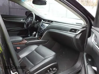 2013 Cadillac XTS z VIN 2G61N5S32D9238652, wystawiony jako IAAI lot #40966692 z przebiegiem 90 834 mil mil oraz . Historia ofert i sprzedaży dostępna na DreamBid. Obrazek 5.