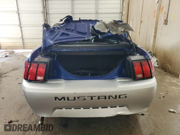 2004 Ford Mustang Deluxe with VIN 1FAFP44684F189081, listed as a Copart auction lot 59474985 with 249,812 mi miles and Salvage title. Bid and sale history available at DreamBid. Image 6.