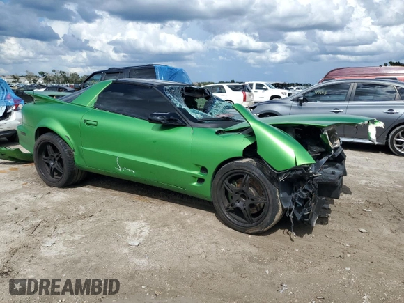 2001 Pontiac Firebird Formula with VIN 2G2FV22G412115819, listed as a Copart auction lot 70310714 with 203,067 mi miles and Salvage title. Bid and sale history available at DreamBid. Image 4.