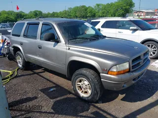 1999 Dodge Durango z VIN 1B4HS28Y2XF665246, wystawiony jako IAAI lot #42111774 z przebiegiem 198 318 mil mil oraz . Historia ofert i sprzedaży dostępna na DreamBid. Obrazek 1.