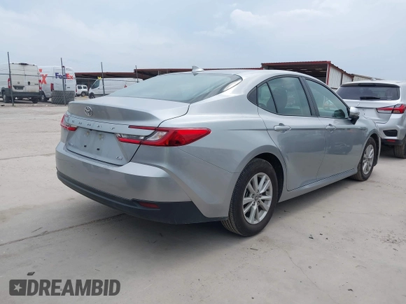 2025 Toyota Camry LE with VIN 4T1DAACK5SU000942, listed as a IAAI auction lot 42144009 with 23,505 mi miles and . Bid and sale history available at DreamBid. Image 4.