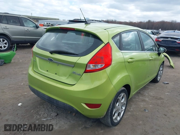 2011 Ford Fiesta SES with VIN 3FADP4FJ3BM171397, listed as a IAAI auction lot 41972516 with 320,424 mi miles and . Bid and sale history available at DreamBid. Image 4.